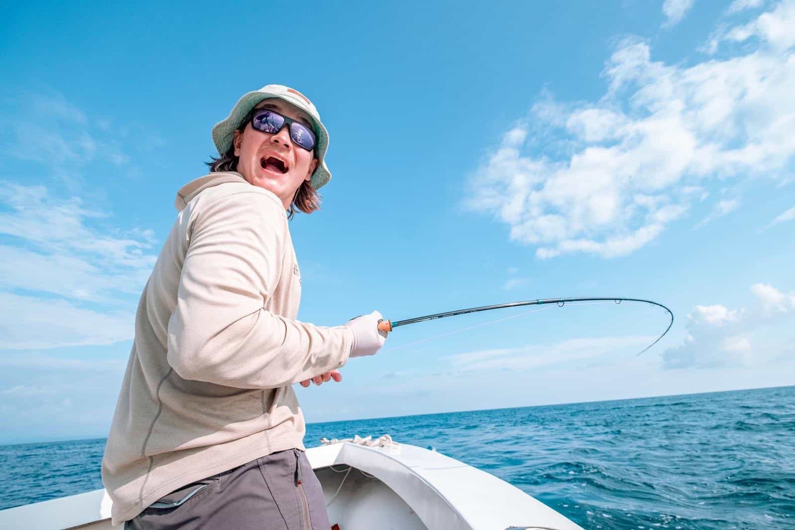 angler excited fly fishing